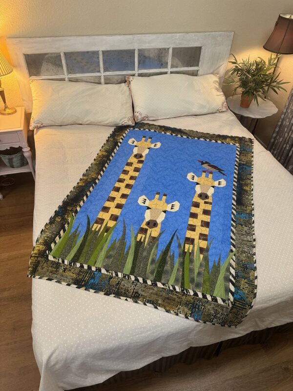 Welcoming Committee Quilt Pattern on bed